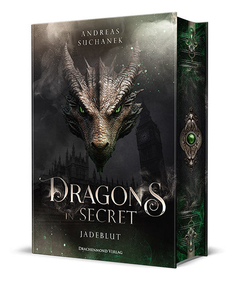 Das Cover zeigt mittig einen großen geschuppten Drachenkopf mit grünen Augen. Darüber steht der Autor, der Titel in großen Buchstaben darunter. Im Hintergrund sind dunkel der Buckingham Palace und der Big Ben abgebildet. Im oberen Bereich sind grau-grüne Rauchwolken um den Drachenkopf. Im unteren Bereich schimmert das Cover grün. Der Buchschnitt ist schwarz mit grauen und grünen Rauchschwaden und mittig einem Amulett mit zwei Drachenköpfen und einem grünen Edelstein.